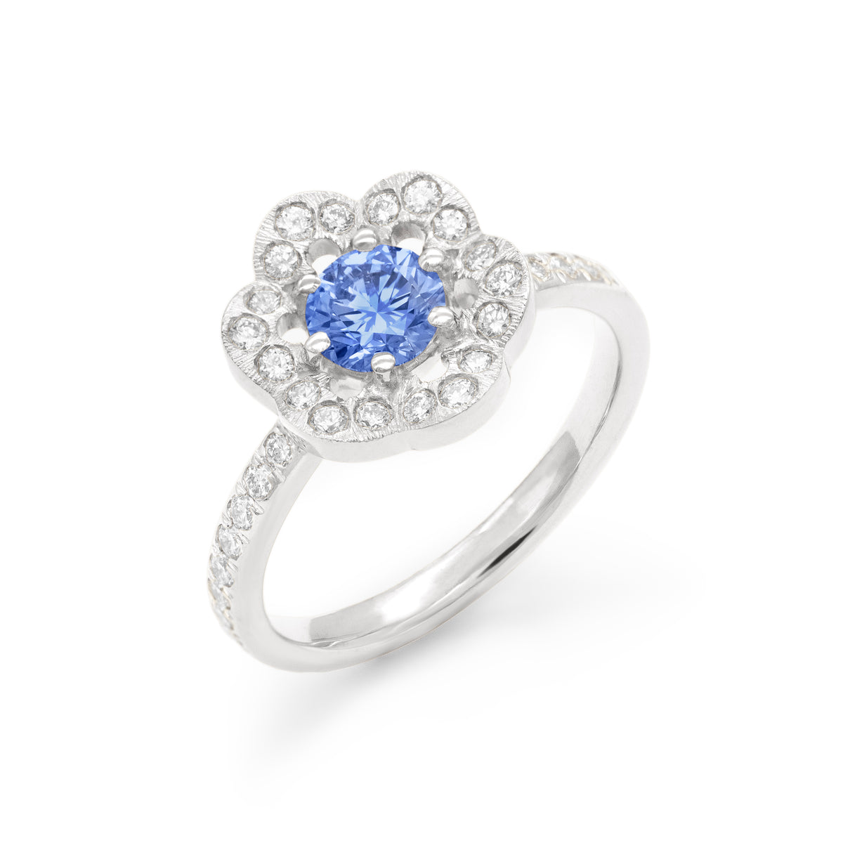 Bague entourage Coquillages saphir corps pavé