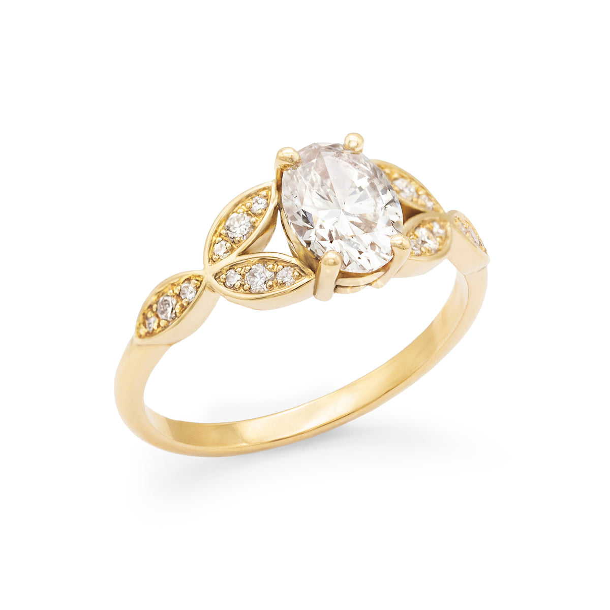 Bague de fiançailles épaulée de navettes